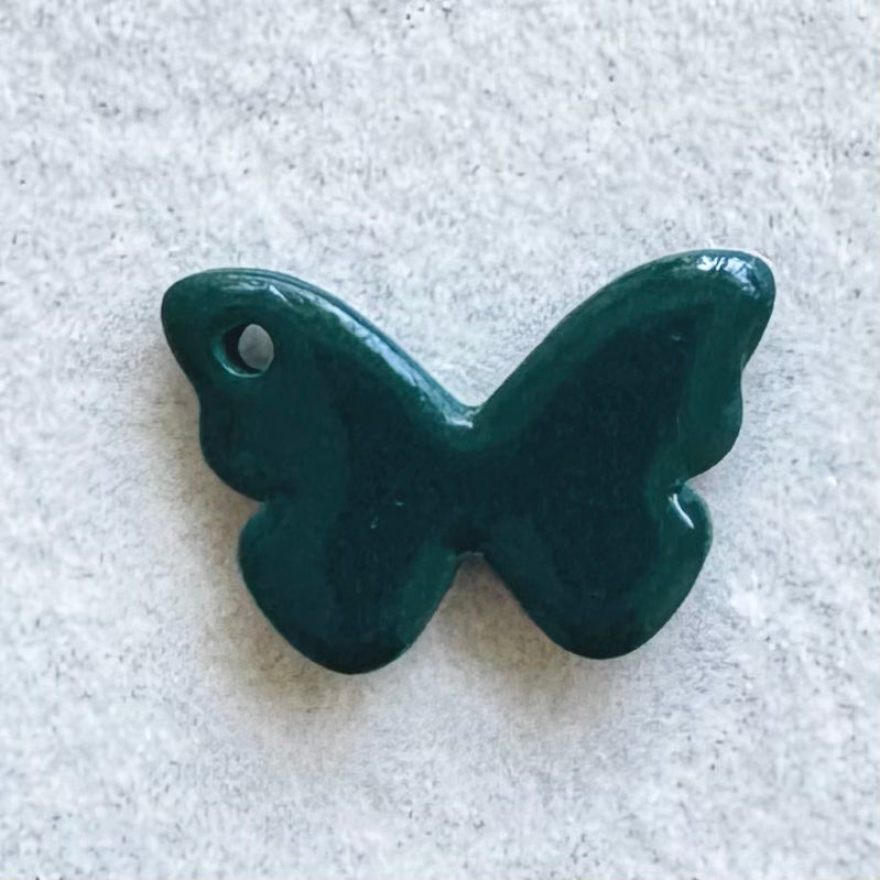 Charm - Papillon pétrole